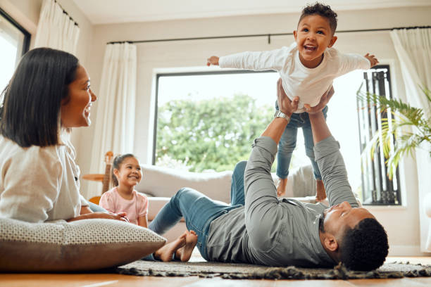 Family relaxing in a living room of an Airbnb short let managed by Renzo Airbnb & short let management in the UK